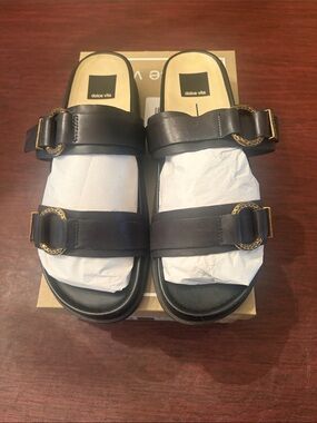 Dolce Vita Soya  Black Leather Double-Buckle Slide Sandals with Gold Accents